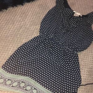 sleeveless polka dot dress. cinches at chest